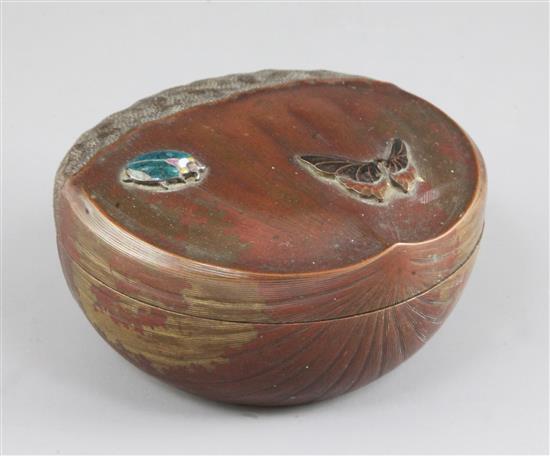 A Japanese patinated bronze and enamel box and cover, modelled as a chestnut, Meiji period, width 11cm